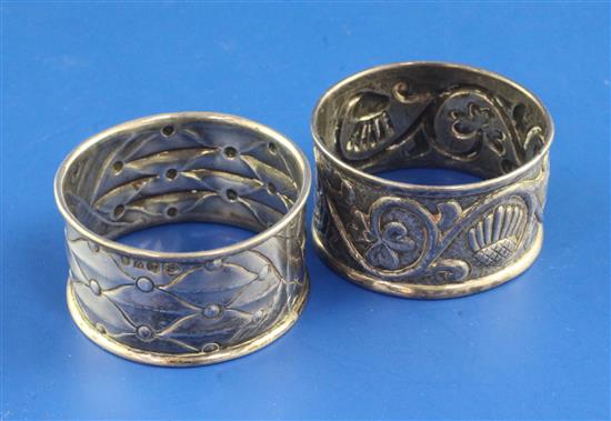 Two George V Arts & Crafts Keswick School of Industrial Art repousse silver napkin rings, 44 grams.